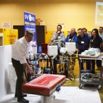 Attendees gained hands-on experience in Reusable Bag Molding from Composites One Technical Services Manager Jim Noonan (left) at the Oak Ridge National Laboratory’s Manufacturing Demonstration Facility.